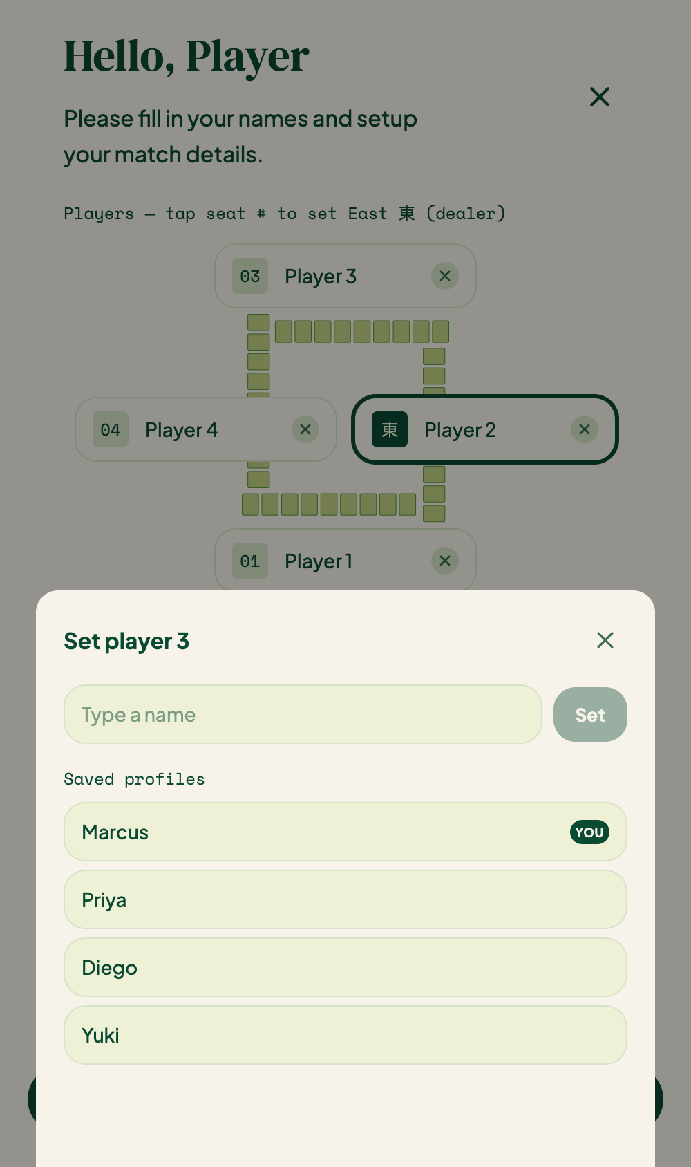 The bottom-sheet seat picker with a name field and a Saved profiles list